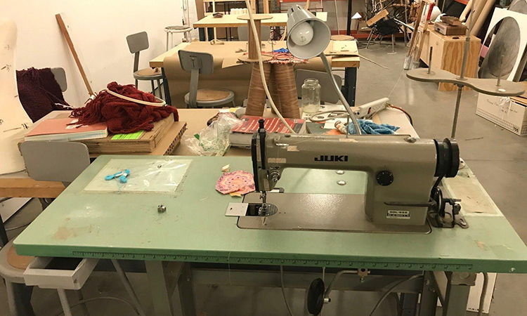 A sewing machine and supplies in the Sculpture lab